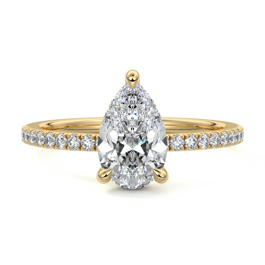 Pavé pear-shaped engagement ring in gold, handcrafted by Nura Lab in New Zealand