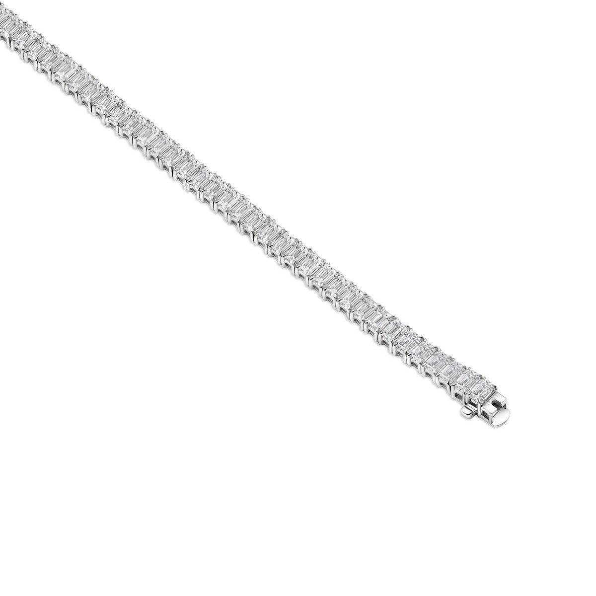 Close-up of emerald tennis bracelet links and secure box clasp – 14K White Gold