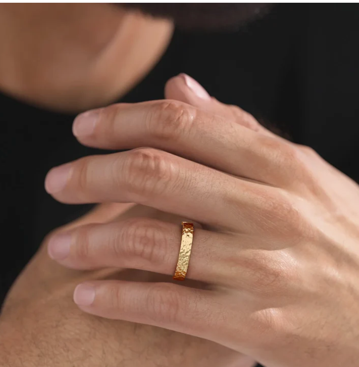 Close-up detail of hammered texture on Nura Lab men’s engagement ring plain band