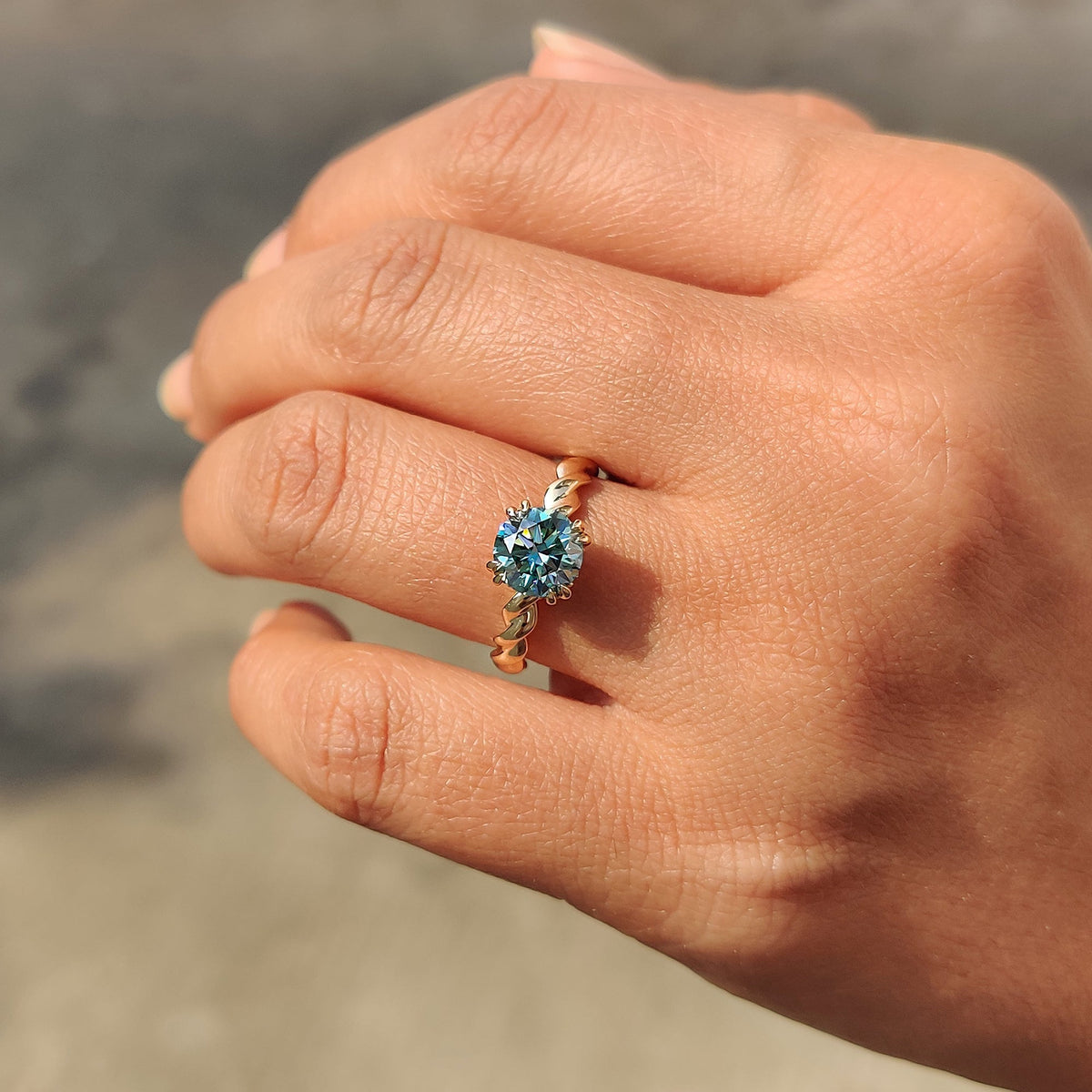 Genevieve Claire - Cyan Blue Round Cut Hidden Halo Ring With Twisted Rope Band