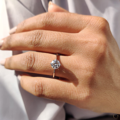 Clarissa Belle - Round Solitaire Engagement Ring With Tapered Shank Design