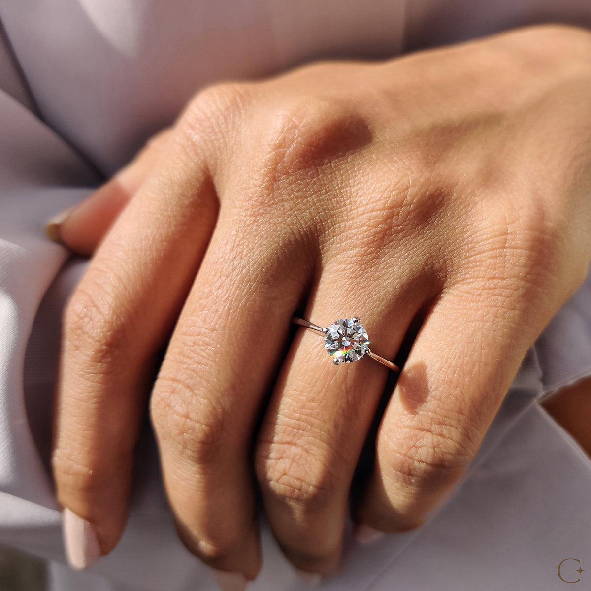 Clarissa Belle - Round Solitaire Engagement Ring With Tapered Shank Design