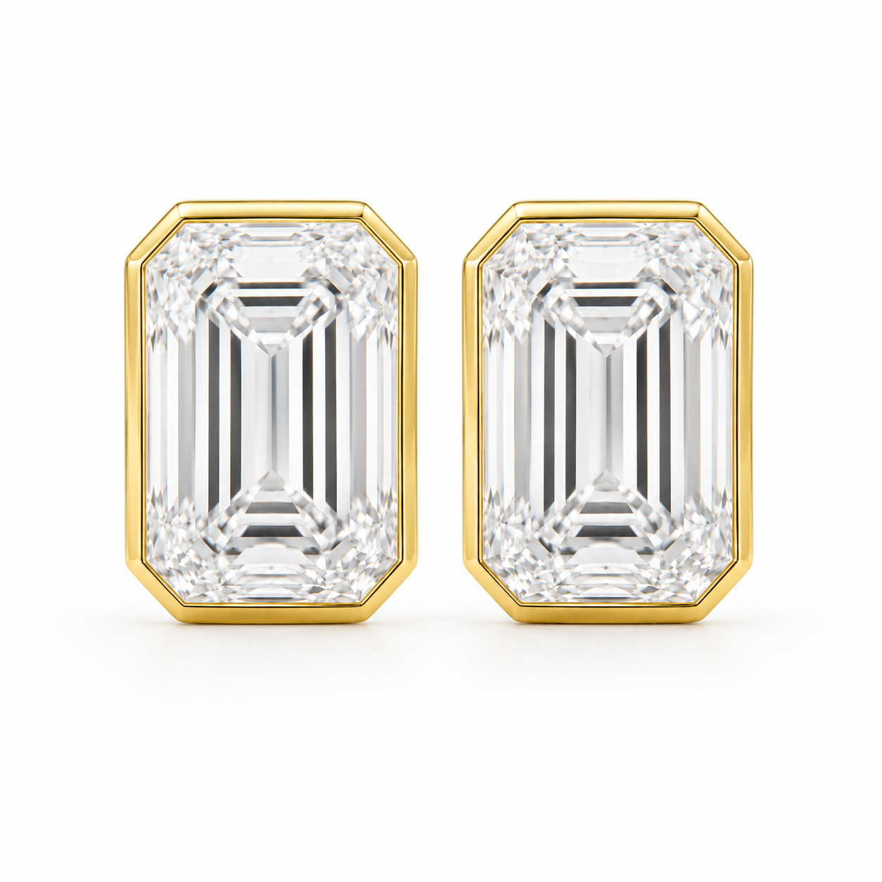 Clare - Emerald Cut Bezel Stud Moissanite Earrings 14K Yellow Gold.