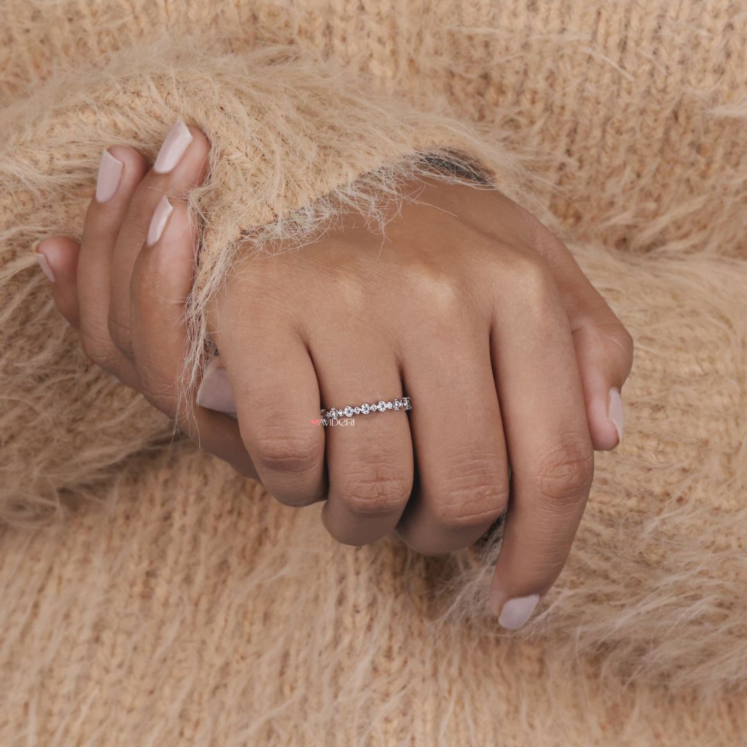 This designer wedding band is handcrafted for a unique and luxurious look with fine detailing.
