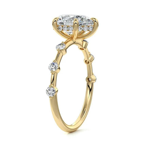 Close-up of Nura Michael Hill Rings Lab Pear Cut Unique Diamond Engagement Ring in 18K white gold with a pear-shaped lab-grown diamond