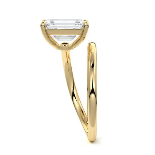 Emerald cut spiral diamond engagement ring in yellow gold with lab-grown center stone