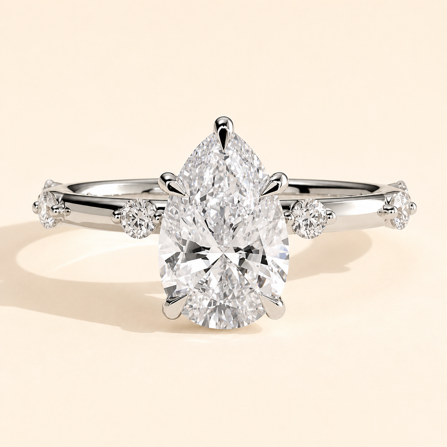 Side stone engagement ring