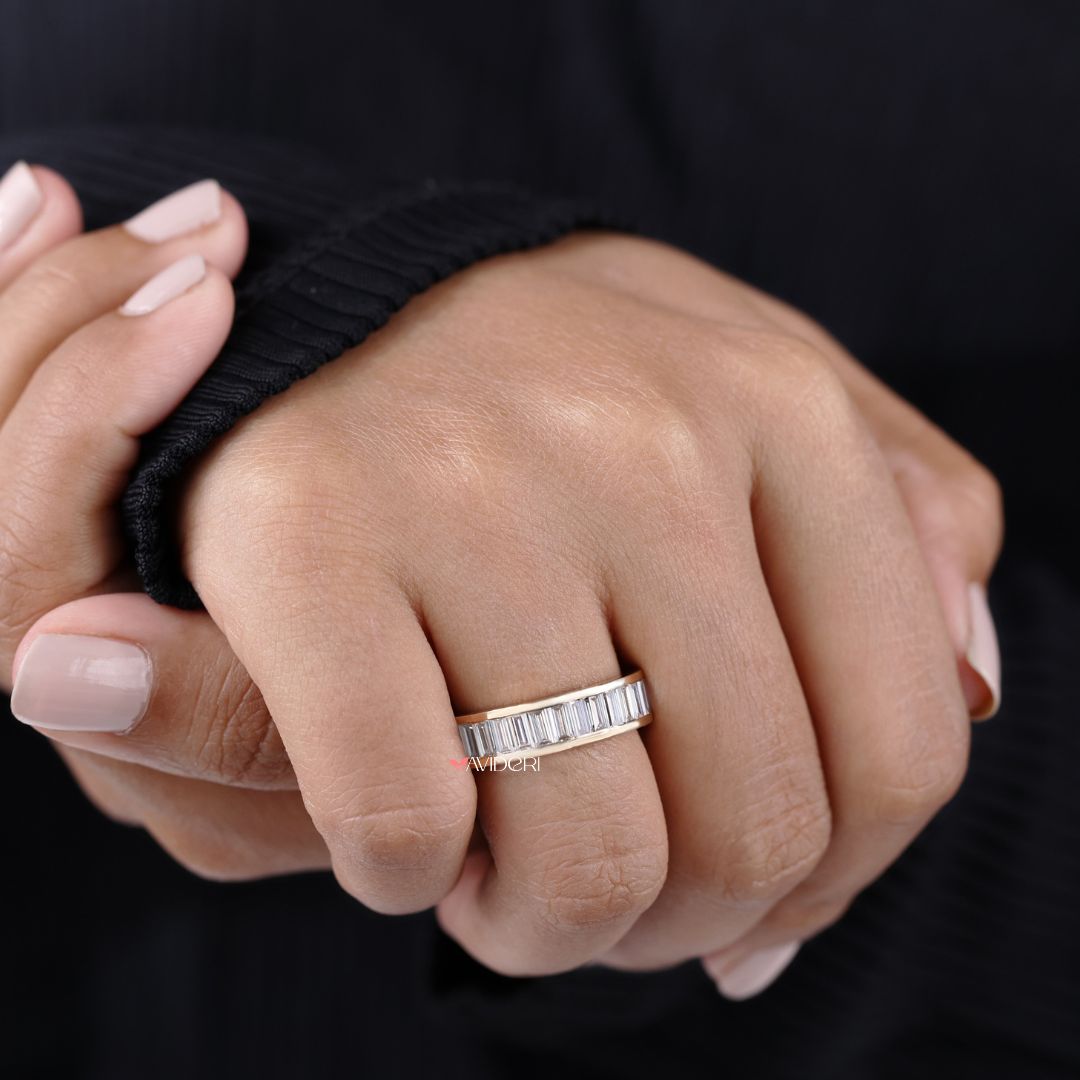 Moissanite wedding band delivers long-lasting shine with ethical brilliance.
