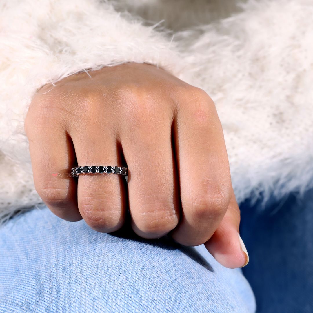 White gold band featuring a moissanite eternity band for timeless beauty.
