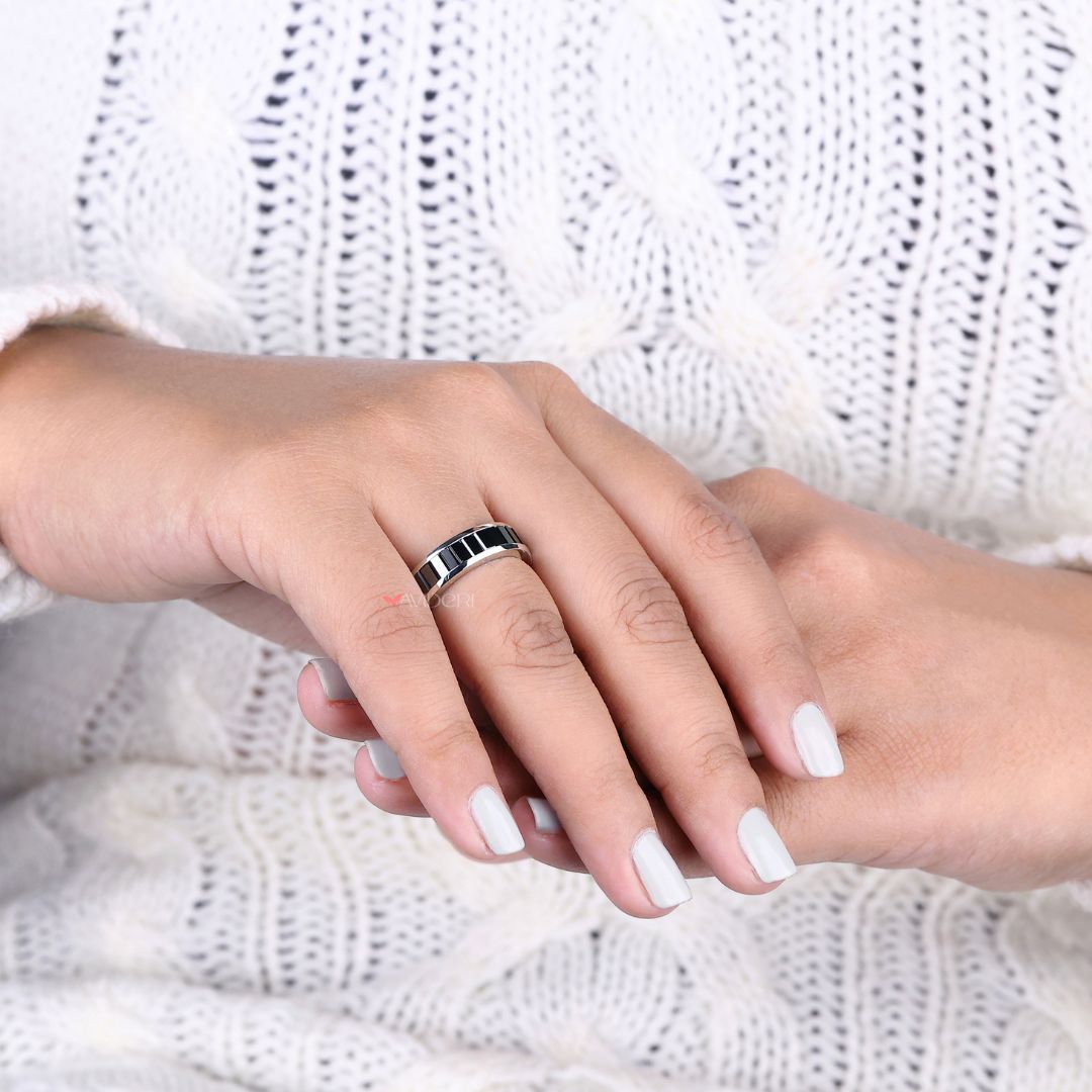 White gold wedding band designed to showcase beautiful baguette diamonds.
