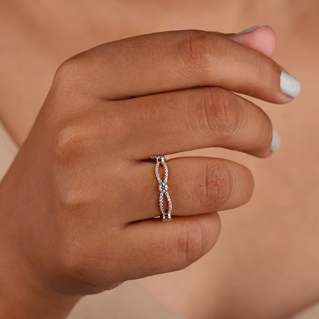 Twisted band adds a dynamic design element with interwoven curves for a modern look.

