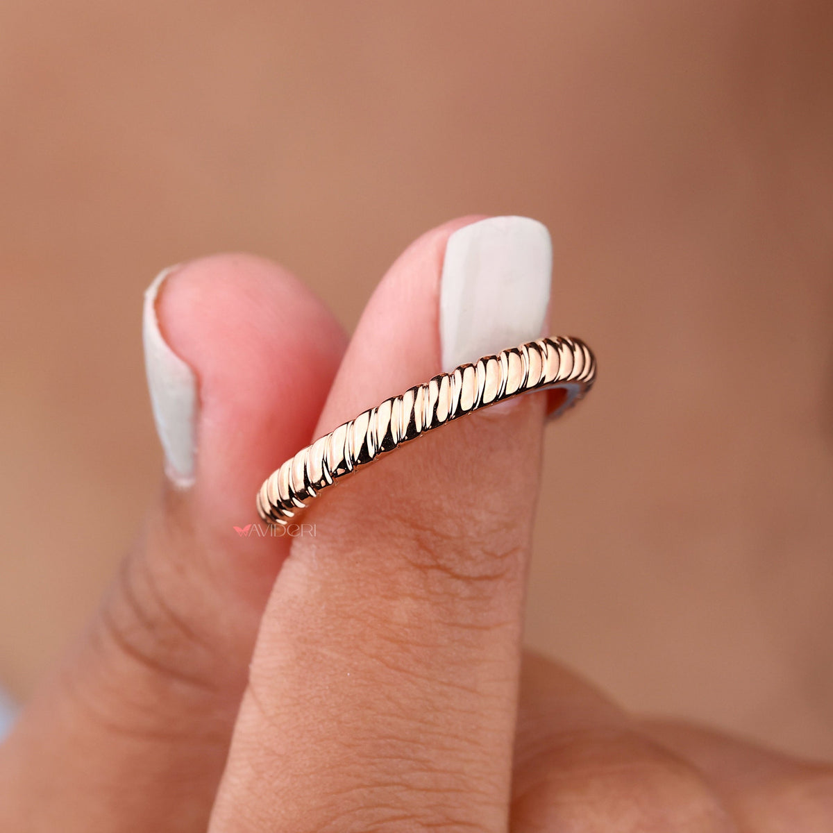 Moissanite wedding band offers brilliant shine with an eco-conscious sparkle.

