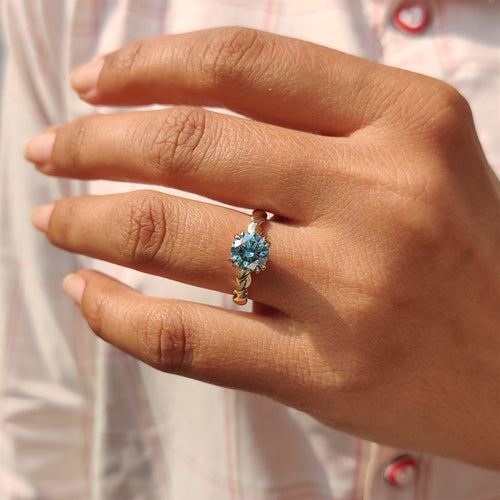 Genevieve Claire - Cyan Blue Round Cut Hidden Halo Ring With Twisted Rope Band