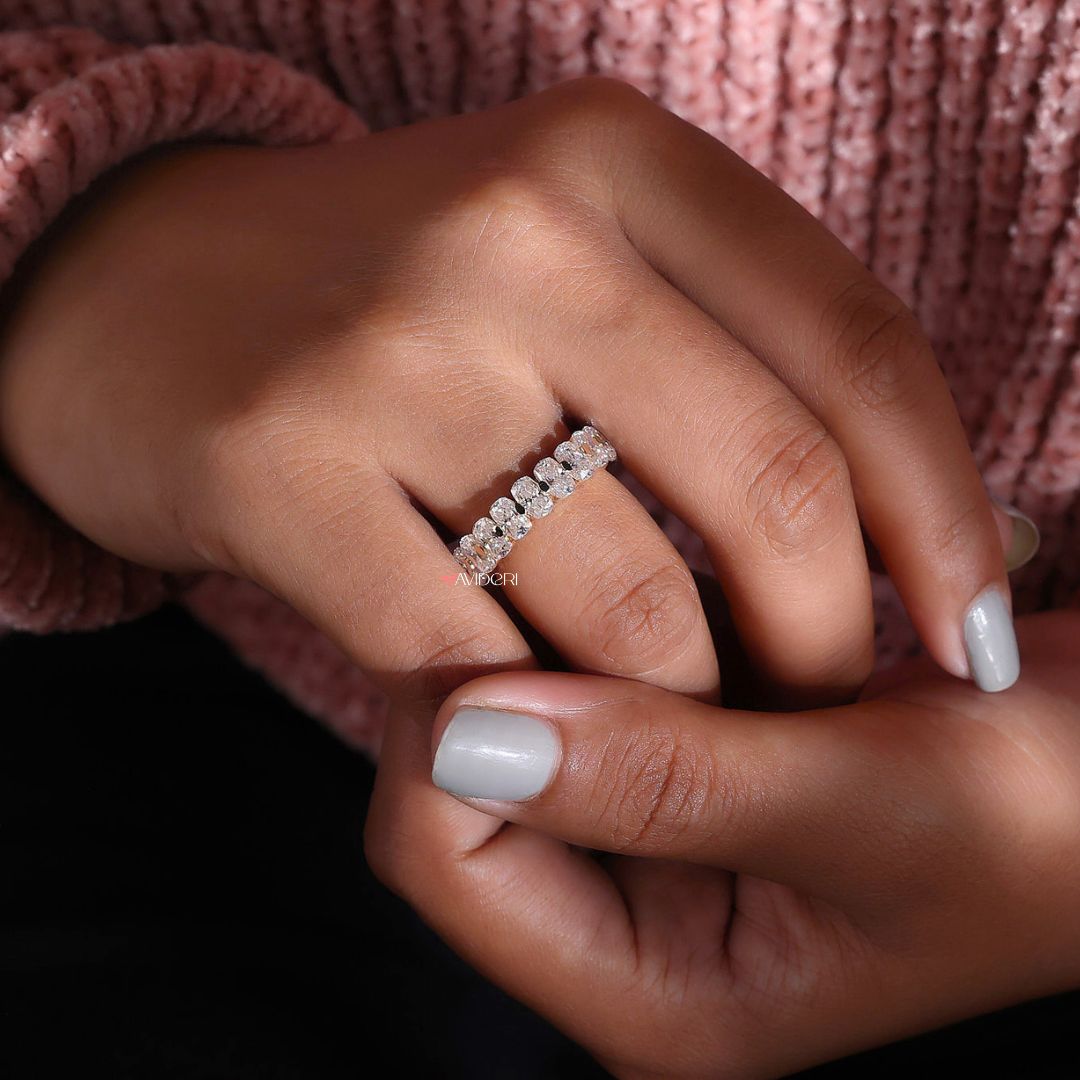A cushion wedding band features soft, rounded edges and shine.