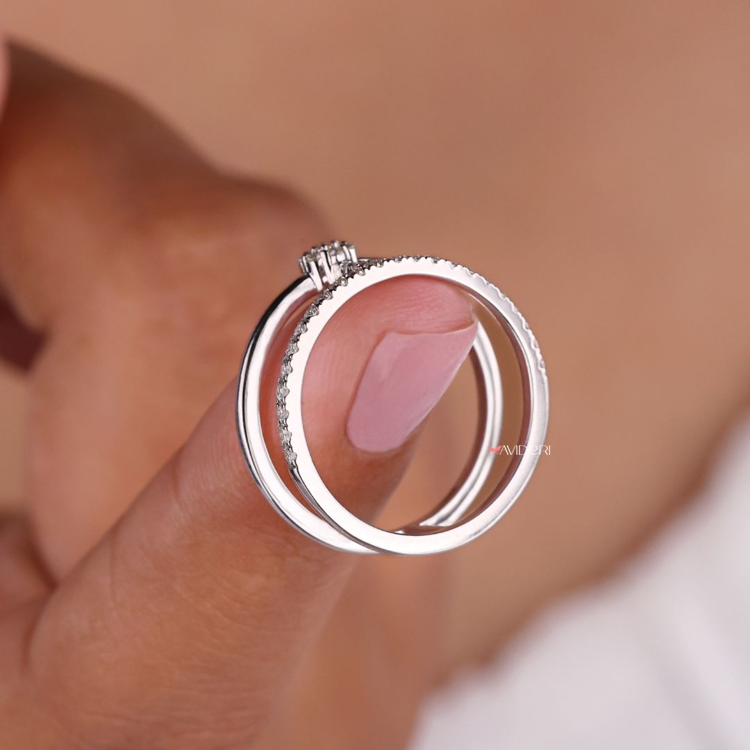 The geometric ring band adds a modern, unique touch.
