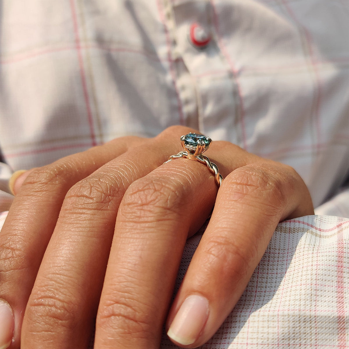 Genevieve Claire - Cyan Blue Round Cut Hidden Halo Ring With Twisted Rope Band