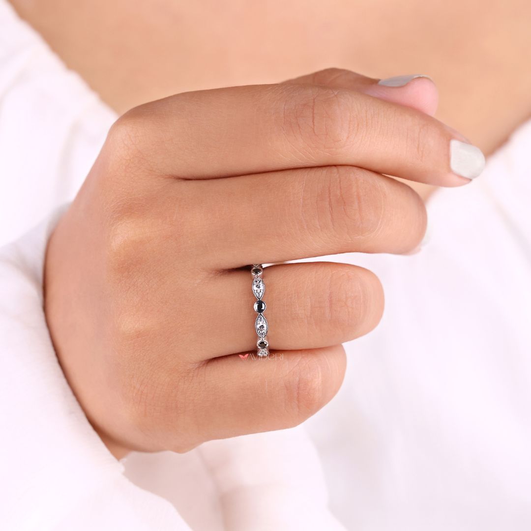 Moissanite gold wedding band pairs radiant moissanite with the warmth of gold for a luxurious finish.
