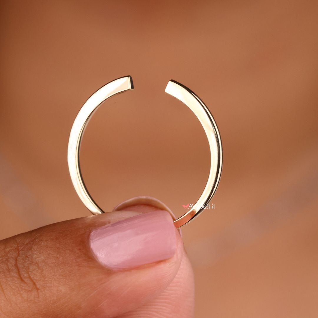 A moissanite wedding band sparkles with lasting beauty.
