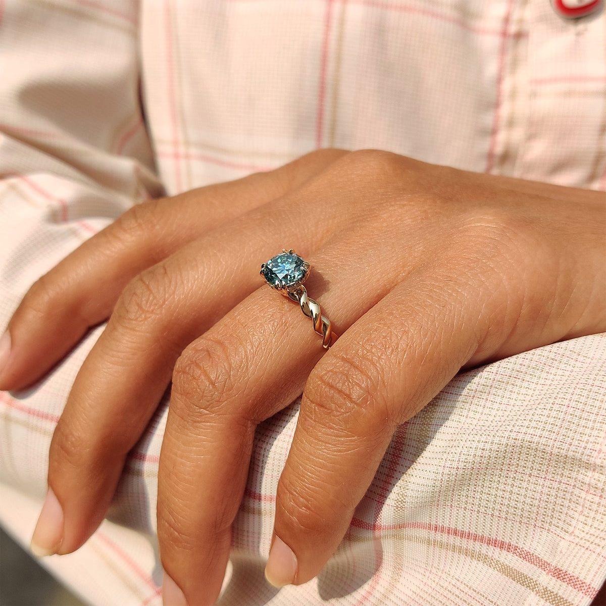 Genevieve Claire - Cyan Blue Round Cut Hidden Halo Ring With Twisted Rope Band