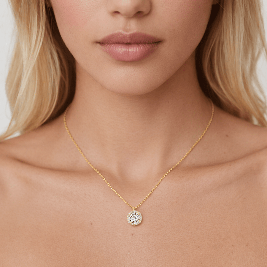 Halo lab-grown moissanite pendant necklace on neck in 14K yellow gold, 1ct round centre, VVS1 D–E, Nura Lab NZ