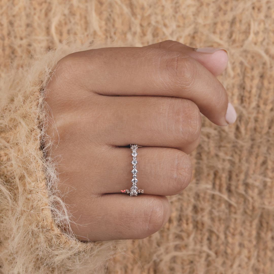 This white gold wedding band adds a radiant touch to your everyday or bridal jewelry collection.
