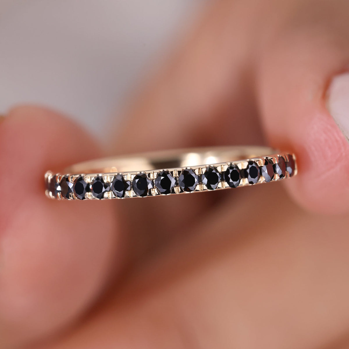Round eternity band featuring a round cut wedding band design.
