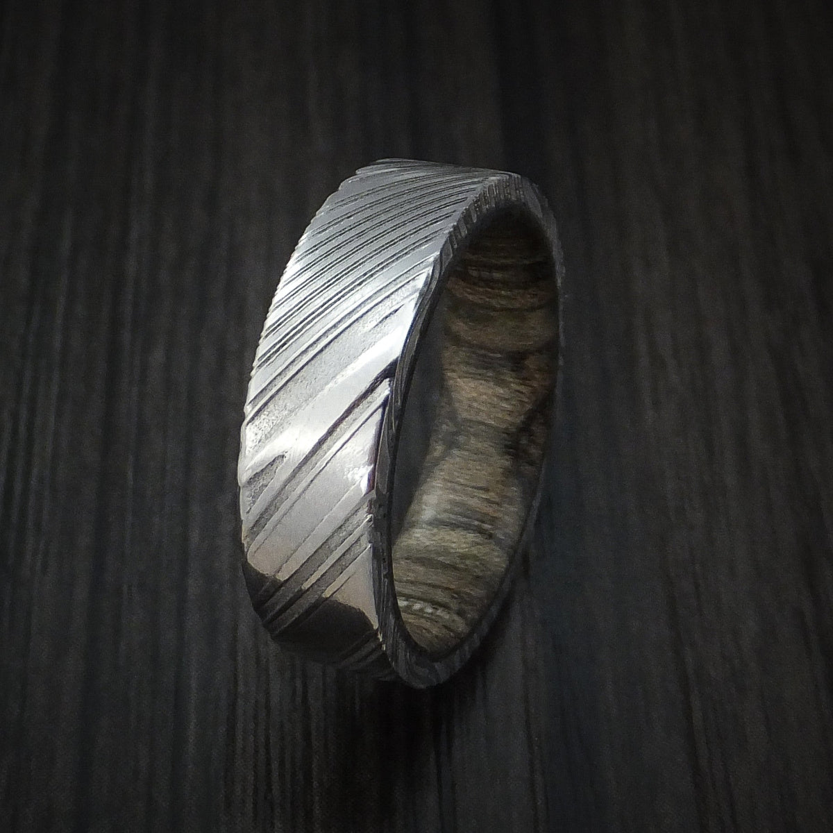 Harbour XI - Woodgrain Kuro Damascus Steel Men's Wedding Ring with Walnut Hardwood Sleeve Wood Band - view 4 - Nura Lab