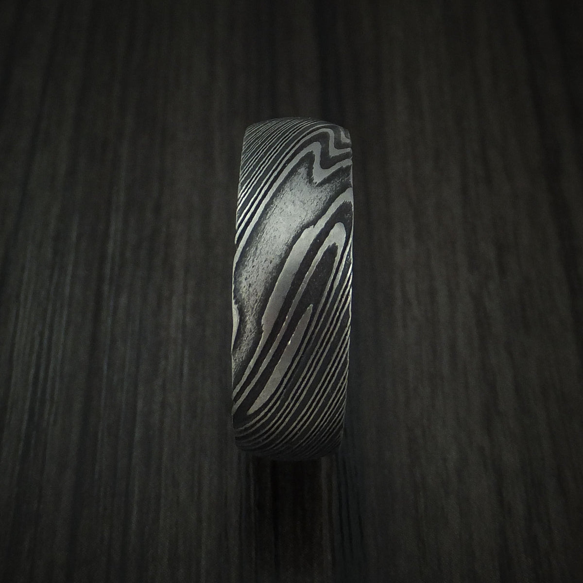 Glacier X - Woodgrain Kuro Damascus Steel Men's Wedding Ring with Zebra Wood Hardwood Sleeve Wood Band - view 3 - Nura Lab
