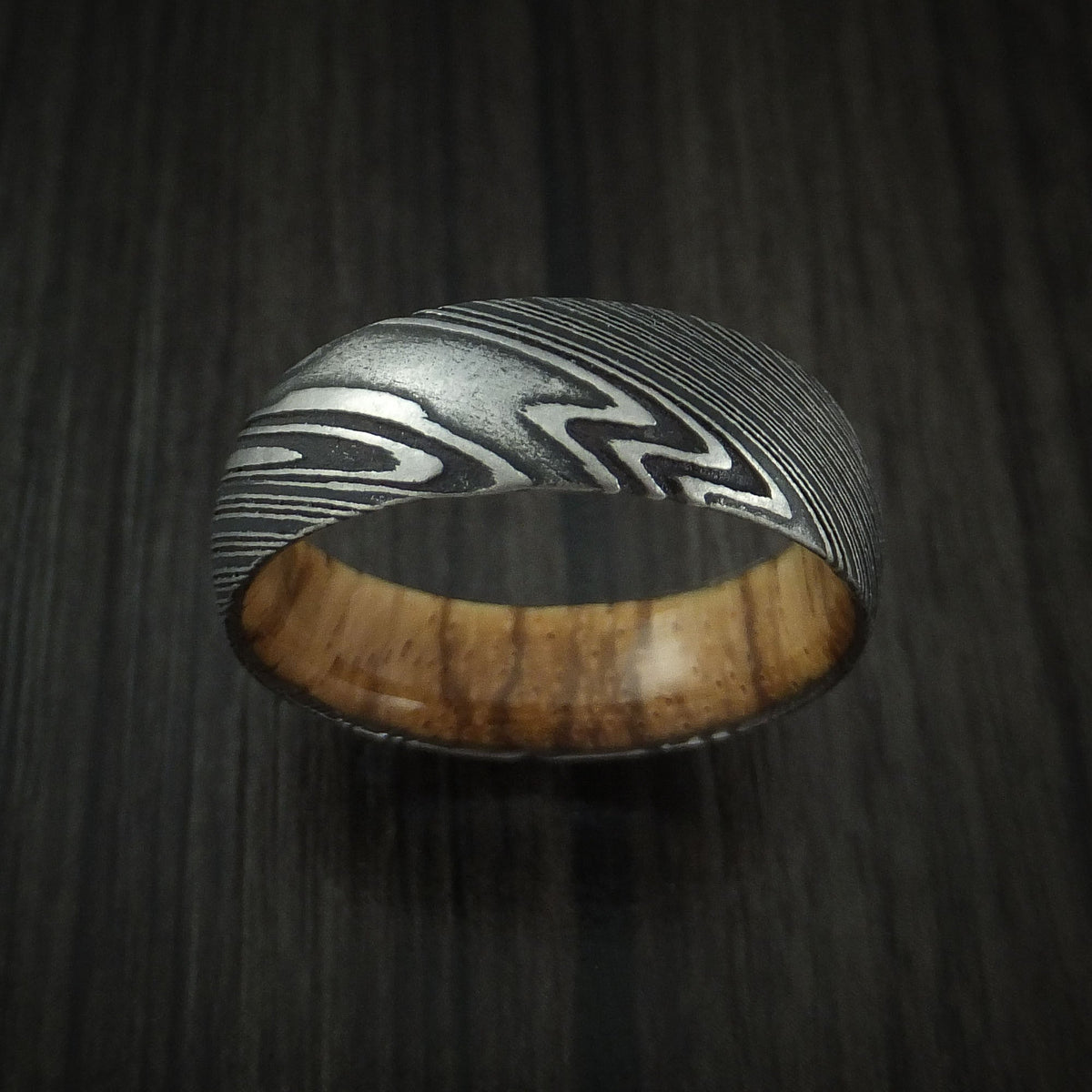 Glacier X - Woodgrain Kuro Damascus Steel Men's Wedding Ring with Zebra Wood Hardwood Sleeve Wood Band - view 2 - Nura Lab