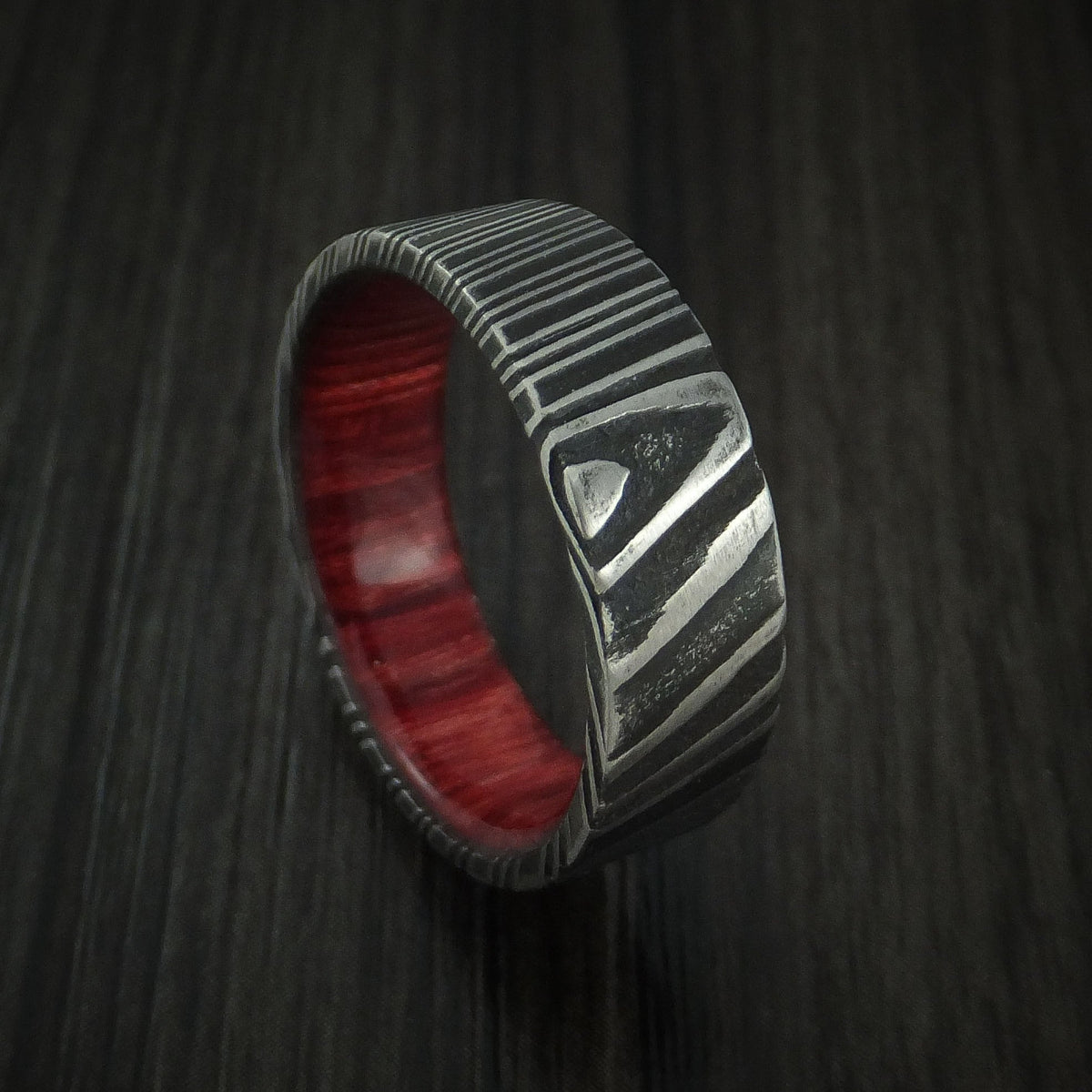 Solstice XI - Woodgrain Kuro Damascus Steel Men's Wedding Ring with Red Heart Wood Hardwood Sleeve Wood Band - Nura Lab