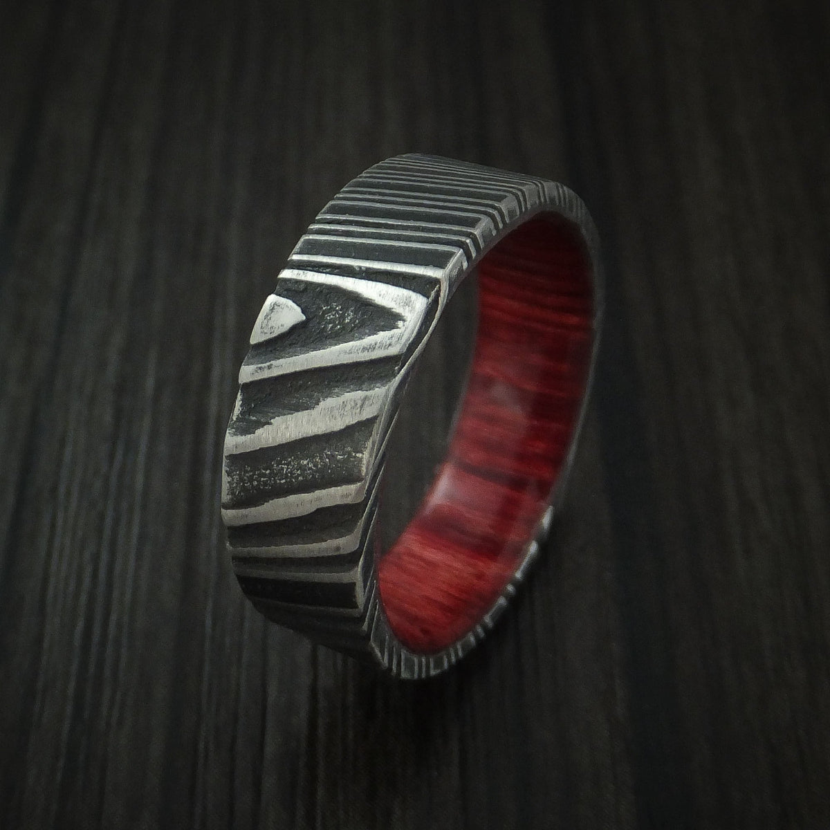 Solstice XI - Woodgrain Kuro Damascus Steel Men's Wedding Ring with Red Heart Wood Hardwood Sleeve Wood Band - view 4 - Nura Lab