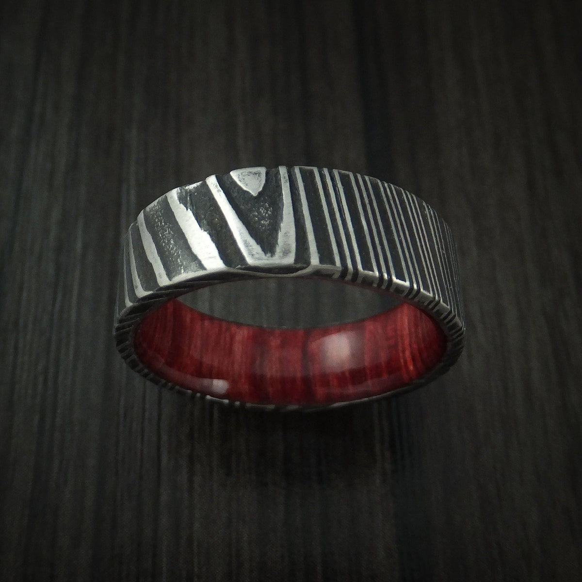 Solstice XI - Woodgrain Kuro Damascus Steel Men's Wedding Ring with Red Heart Wood Hardwood Sleeve Wood Band - view 2 - Nura Lab