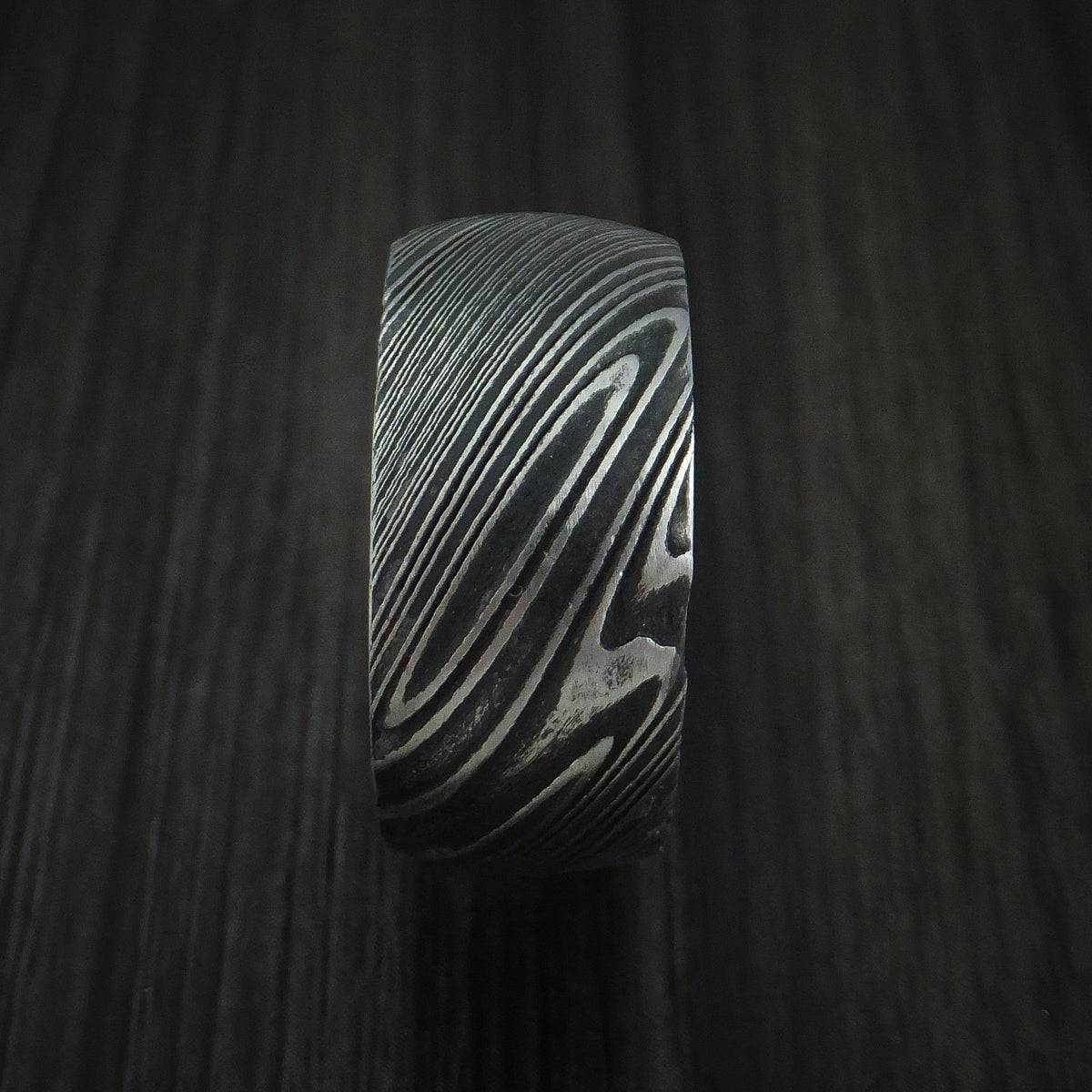 Kingsguard IX - Woodgrain Kuro Damascus Steel Men's Wedding Ring with Koa Wood Hardwood Sleeve Wood Band - view 3 - Nura Lab
