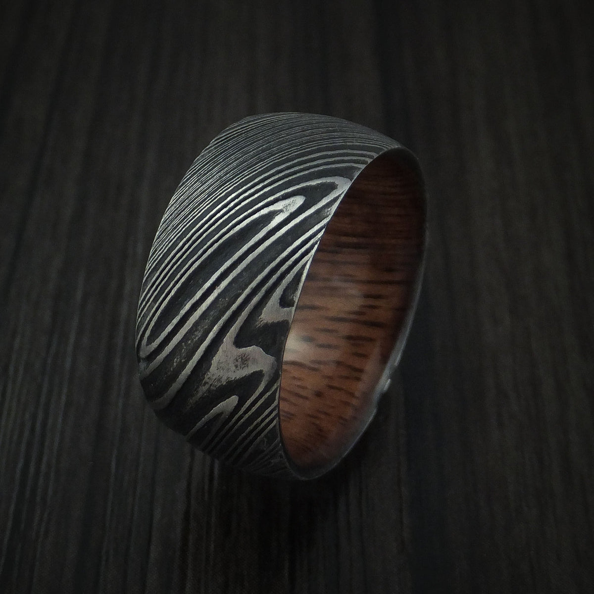 Kingsguard IX - Woodgrain Kuro Damascus Steel Men's Wedding Ring with Koa Wood Hardwood Sleeve Wood Band - view 4 - Nura Lab