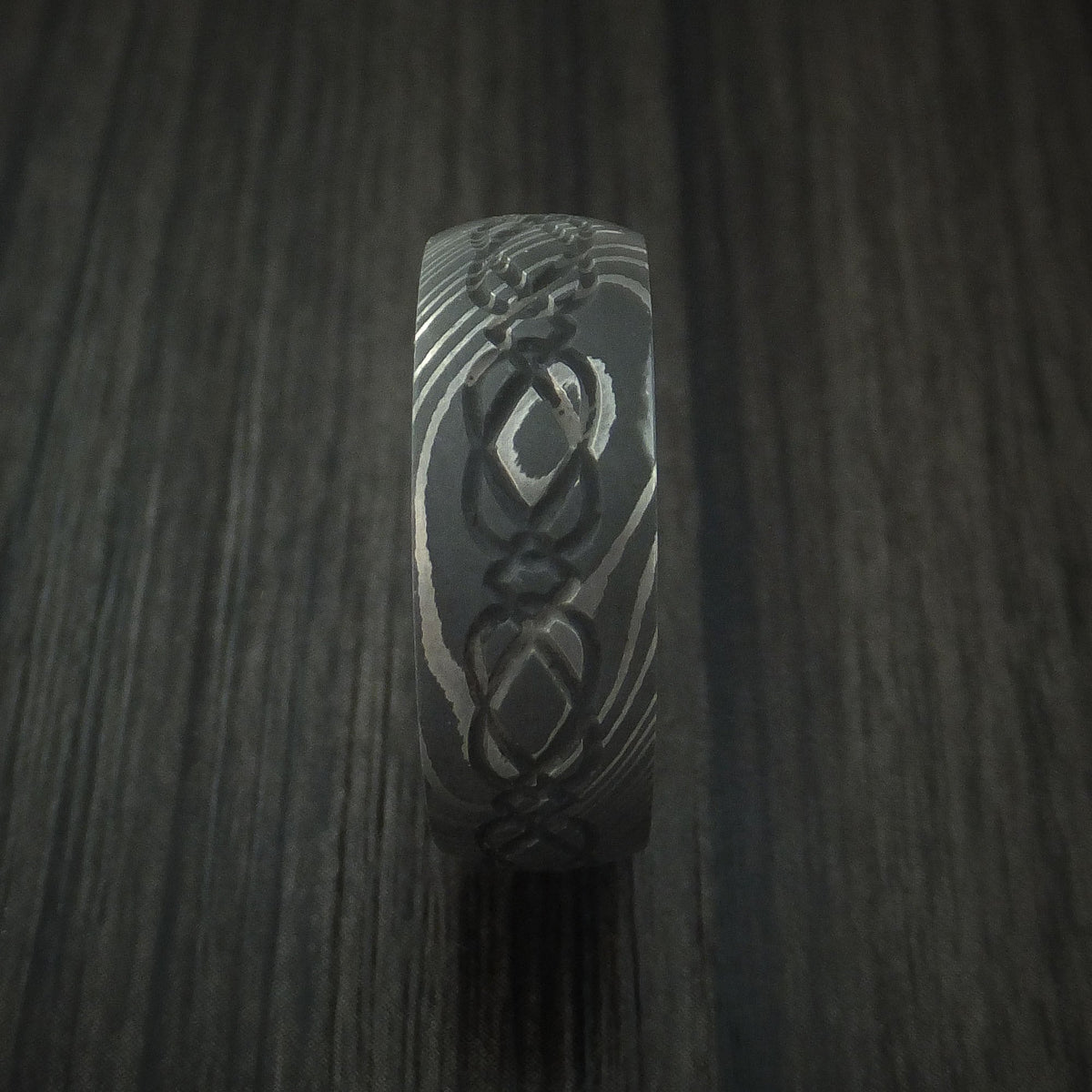 Granite IX - Damascus Steel Celtic Knot Men's Wedding Ring Infinity Design with Hardwood Sleeve - view 3 - Nura Lab