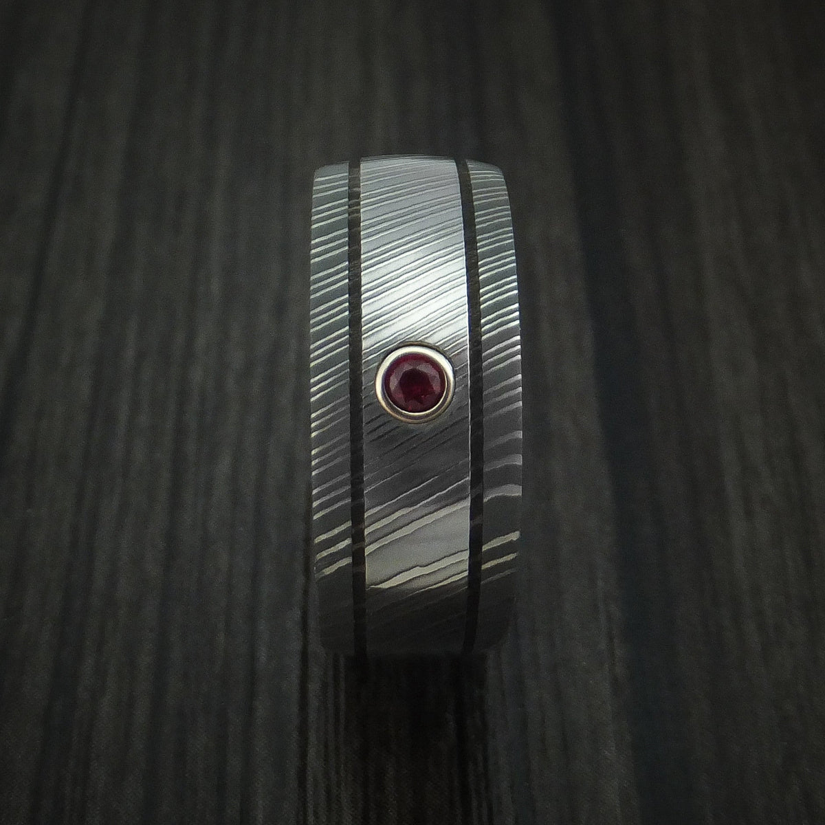 Caesar XI - Damascus Steel Men's Wedding Ring with Bezel Set Ruby Band - view 3 - Nura Lab
