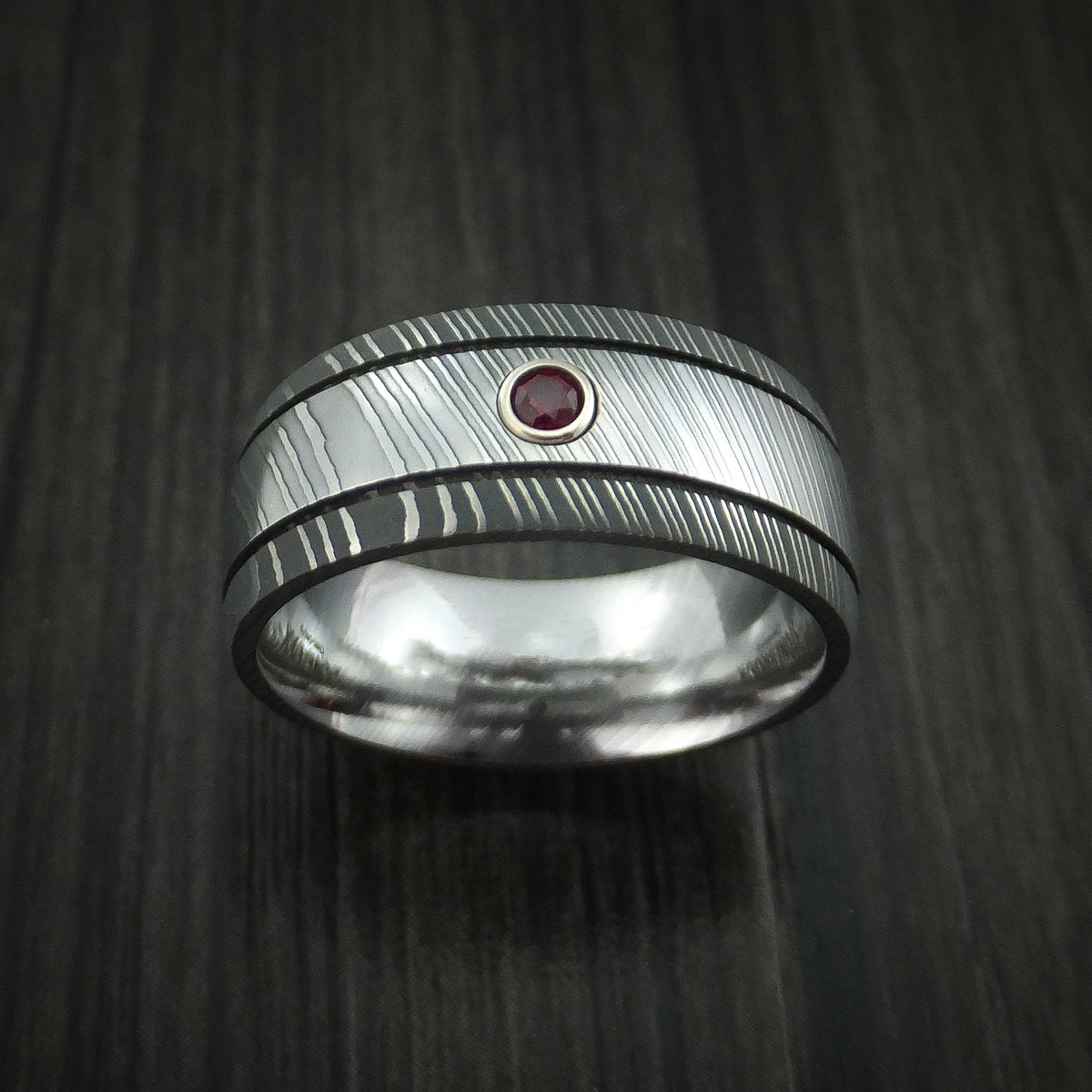Caesar XI - Damascus Steel Men's Wedding Ring with Bezel Set Ruby Band - view 2 - Nura Lab