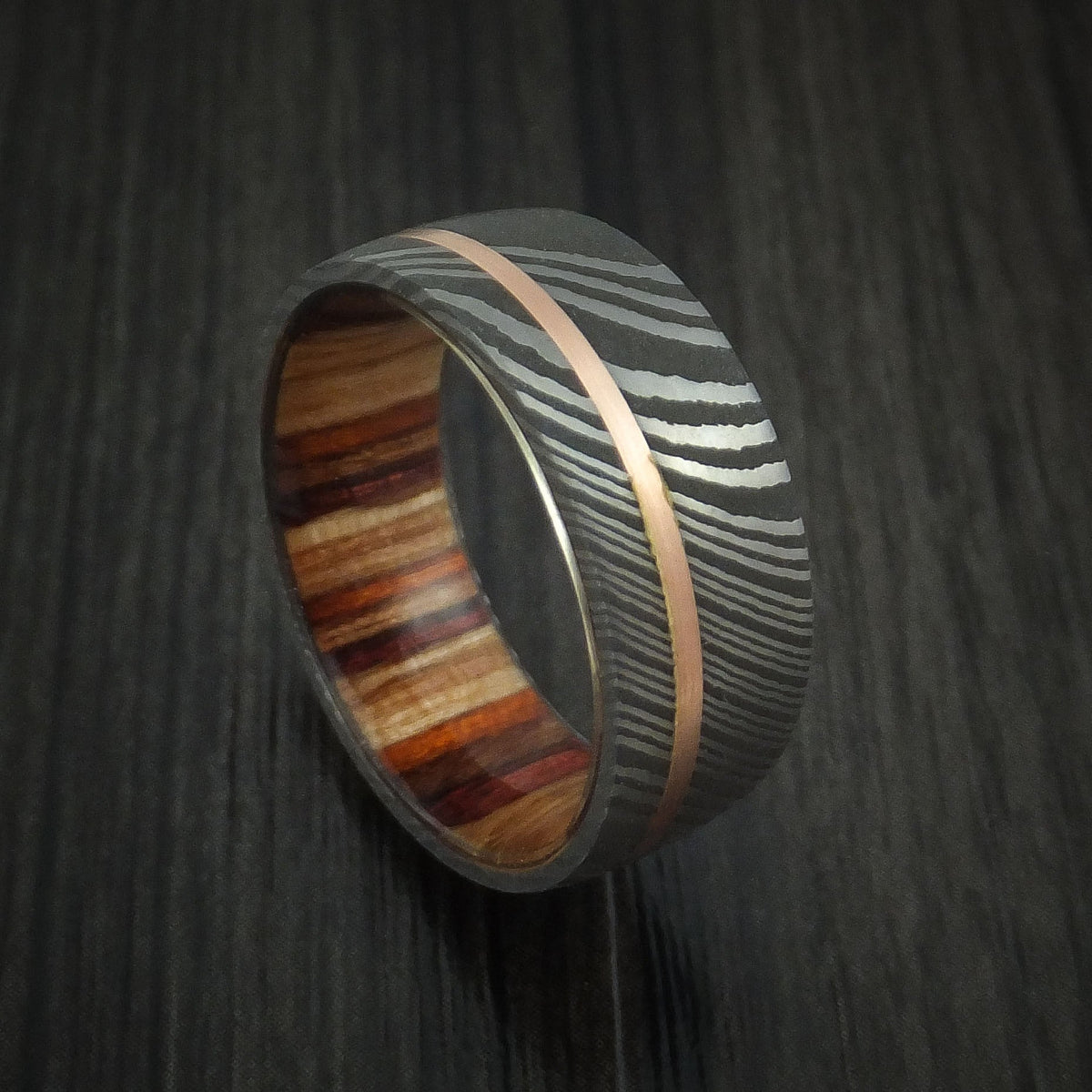 Onyx IX - Damascus Steel and 14k Rose Gold Men's Wedding Ring with Hazelnut Hardwood Sleeve Band - Nura Lab