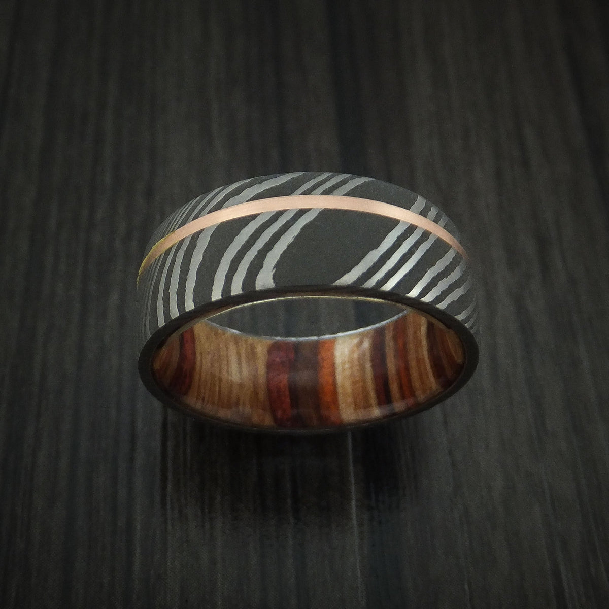 Onyx IX - Damascus Steel and 14k Rose Gold Men's Wedding Ring with Hazelnut Hardwood Sleeve Band - view 2 - Nura Lab