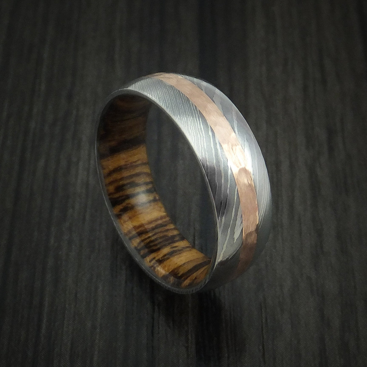 Baron XI - Damascus Steel Men's Wedding Ring with Hammered 14k Rose Gold and Bocote Wood Sleeve - Nura Lab