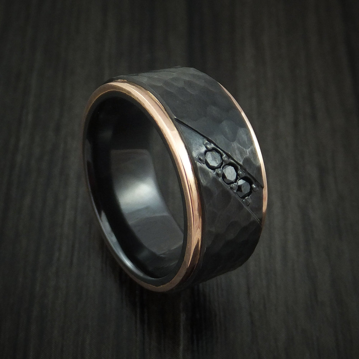 Resolute VII - Black Titanium or Black Zirconium Custom Men's Wedding Ring with Hammered Hammered Finish, 14K Rose Gold Edges, and Black Diamonds - Nura Lab