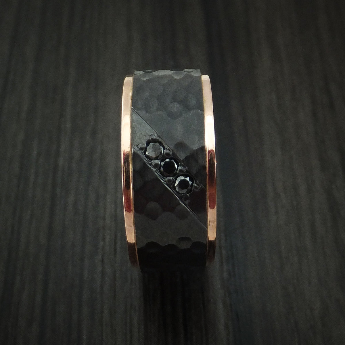 Resolute VII - Black Titanium or Black Zirconium Custom Men's Wedding Ring with Hammered Hammered Finish, 14K Rose Gold Edges, and Black Diamonds - view 3 - Nura Lab