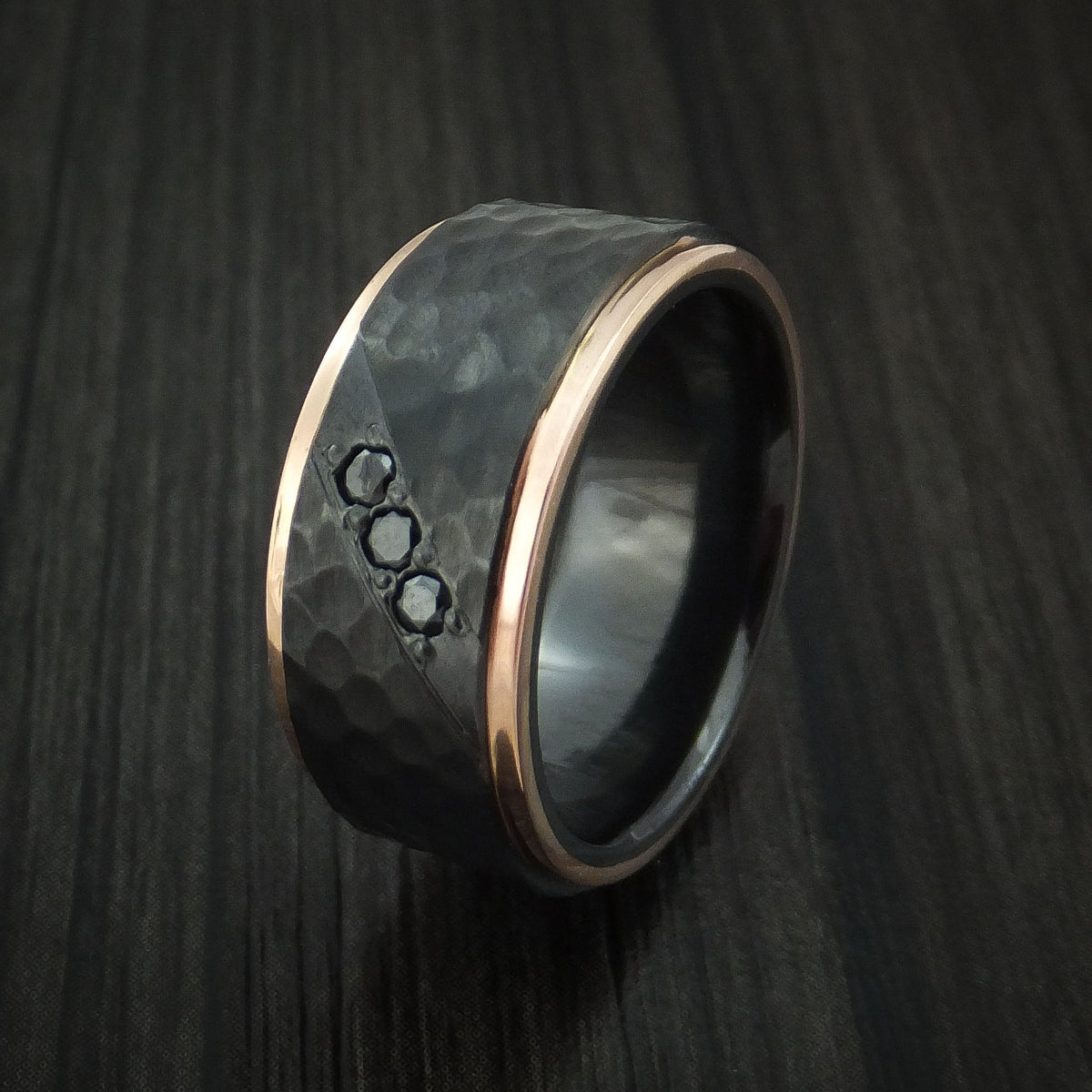 Resolute VII - Black Titanium or Black Zirconium Custom Men's Wedding Ring with Hammered Hammered Finish, 14K Rose Gold Edges, and Black Diamonds - view 4 - Nura Lab