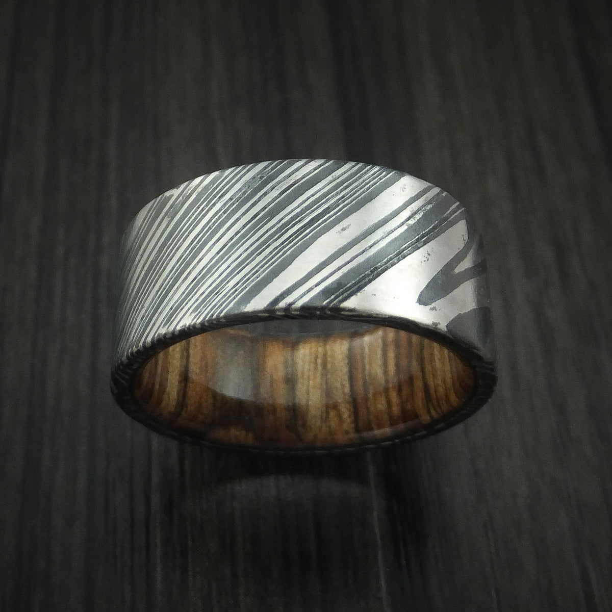 King George XI - Woodgrain Kuro Damascus Steel Men's Wedding Ring with Walnut Wood Hardwood Sleeve Wood Band - view 2 - Nura Lab