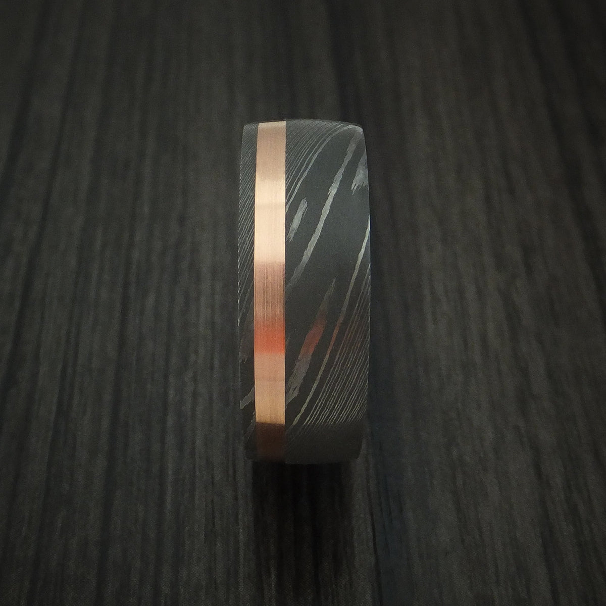Fortress IX - Damascus Steel Men's Wedding Ring with 14k Rose Gold and Whiskey Barrel Wood Sleeve - view 3 - Nura Lab