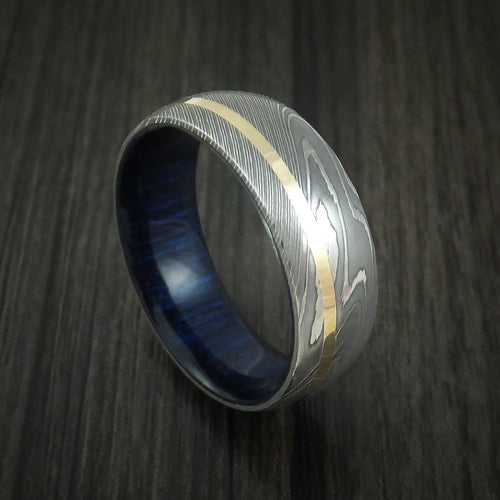 Commander X - Damascus Steel Men's Wedding Ring with 14K Yellow Gold Inlay and Blueberry Wood Hardwood Sleeve Wood Band - Nura Lab