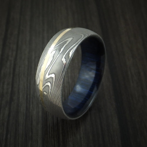 Commander X - Damascus Steel Men's Wedding Ring with 14K Yellow Gold Inlay and Blueberry Wood Hardwood Sleeve Wood Band - view 3 - Nura Lab