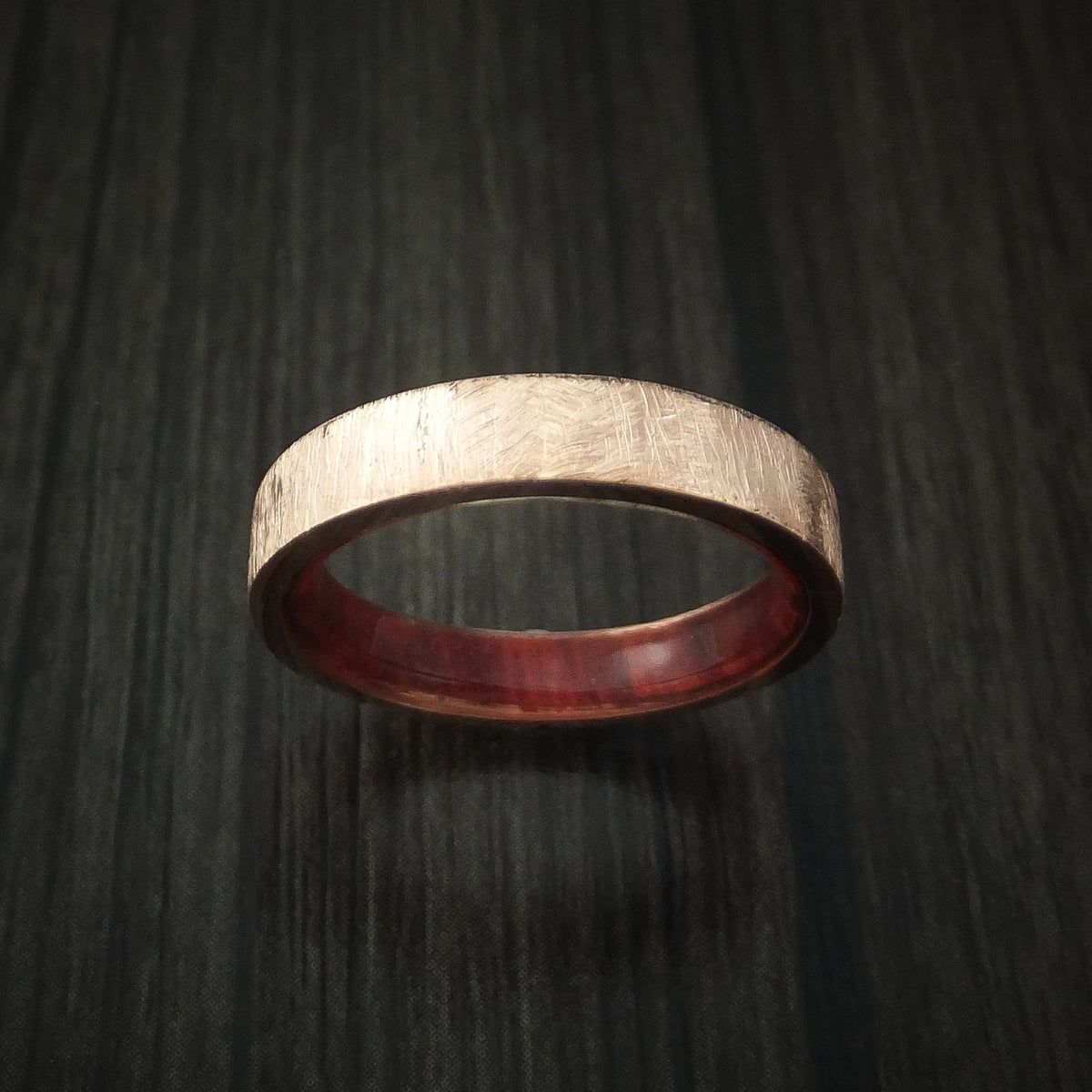 Stonehaven XII - Rose Gold Wedding Ring with Distressed Finish and Red Heart Wood Sleeve - view 2 - Nura Lab