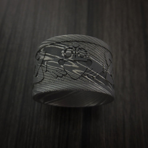 Fiord XI - Wide Damascus Steel Celtic Irish Claddagh Men's Wedding Ring Hands Clasping Heart Band Carved - view 2 - Nura Lab