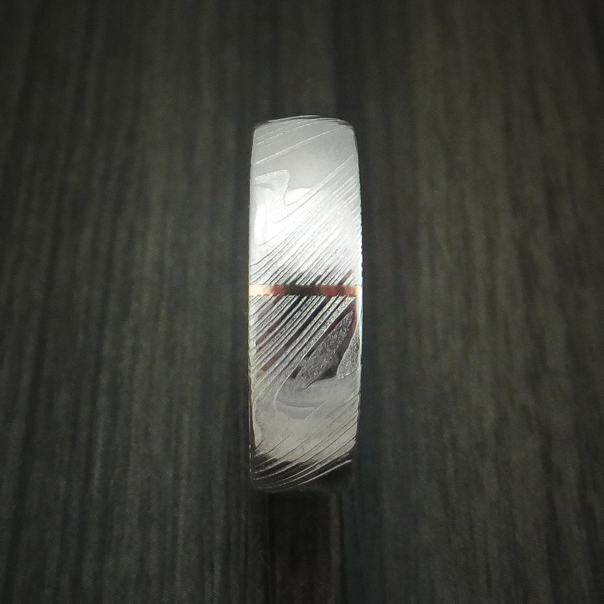 Wolf IX - Woodgrain Kuro Damascus Steel and Vertical 14K Rose Gold Inlay Wedding Ring - view 3 - Nura Lab